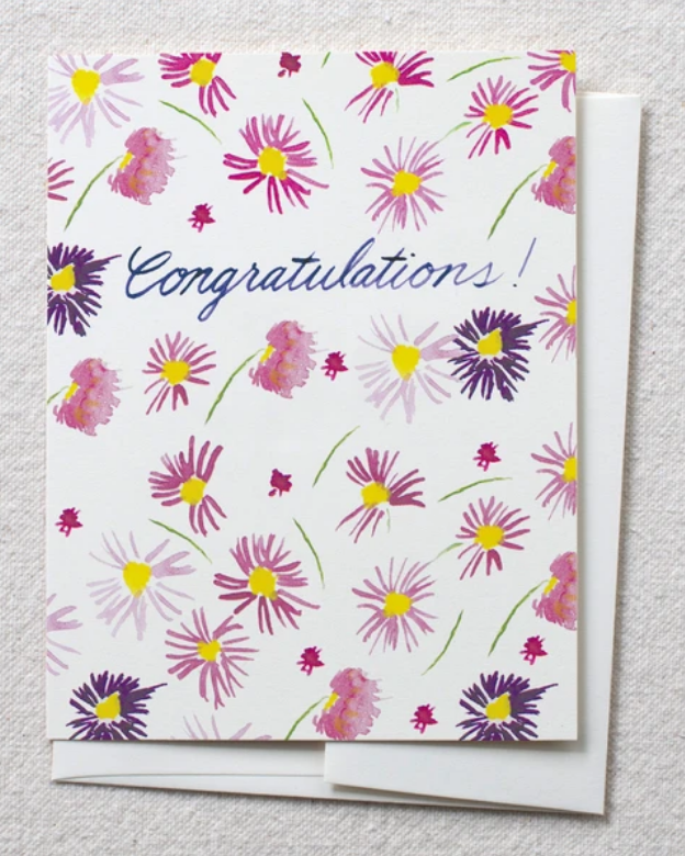 photo of card with watercolor purple aster and text reading 'congratulations'